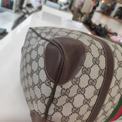 Gucci Borsa a bauletto con nastro web e motivo gg in pelle e 